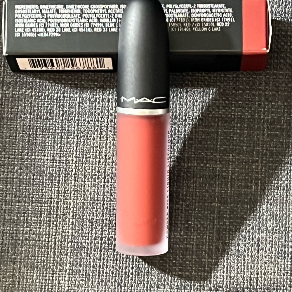 New Mac powder kiss liquid lip color in shade devoted to chile.